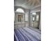 Bedroom featuring sliding mirror closets and built in dresser storage space at 21040 Lazy Days Cir, Lutz, FL 33558