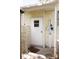Enclosed outdoor shower space features a shower column, privacy walls, and a secure door at 21040 Lazy Days Cir, Lutz, FL 33558