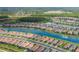 High angle showing community homes, close to bodies of water and nearby roadways at 3051 Francoa Dr, Odessa, FL 33556