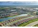 Overhead perspective shows a residential community encircling a network of tranquil lakes at 3051 Francoa Dr, Odessa, FL 33556