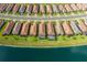 Aerial photo displays the community's attractive homes located on lush lawns by the water at 3051 Francoa Dr, Odessa, FL 33556