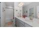This bathroom has double sinks, white countertops, and a separate tub and shower area at 3051 Francoa Dr, Odessa, FL 33556