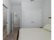 Bedroom features a neutral color palette and multiple doorways, creating an open feel at 3051 Francoa Dr, Odessa, FL 33556