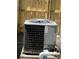 Exterior AC unit professionally installed next to a new privacy fence in the backyard at 3304 Honeymoon Ln, Holiday, FL 34691