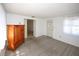 Cozy bedroom with carpet, bright white walls and natural light from the window at 3851 Redwood Dr, Holiday, FL 34691