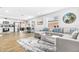 Cozy living room featuring comfortable seating, kitchen access, and stylish decor at 4057 67Th N Ave, Pinellas Park, FL 33781