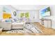 Inviting living room featuring stylish decor, a comfortable couch, and a large window at 4057 67Th N Ave, Pinellas Park, FL 33781