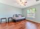 Spare bedroom with hardwood floors, ceiling fan and natural light at 4094 Braemere Dr, Spring Hill, FL 34609