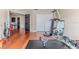 Home gym with wood flooring, exercise equipment, and ample natural light at 4094 Braemere Dr, Spring Hill, FL 34609