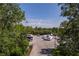 RV and trailer parking area surrounded by trees, providing ample space for community vehicles at 4094 Braemere Dr, Spring Hill, FL 34609