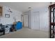 Spacious bedroom features two closets, neutral carpet, and blue accents at 4215 Maplehurst Way, Spring Hill, FL 34609