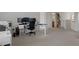 Expansive bonus room with multiple workstations, neutral decor, and ample storage at 4215 Maplehurst Way, Spring Hill, FL 34609