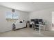 Versatile bonus room or office space with plenty of natural light and workspace at 4215 Maplehurst Way, Spring Hill, FL 34609