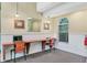 Functional business center providing a dedicated workspace with built-in desks, chairs and natural light at 4215 Maplehurst Way, Spring Hill, FL 34609