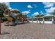 Community playground featuring slides, climbing structures, and covered picnic areas for residents at 4215 Maplehurst Way, Spring Hill, FL 34609