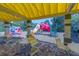 Community playground offers shaded tables and colorful play equipment for enjoyment at 4215 Maplehurst Way, Spring Hill, FL 34609