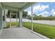 Screened patio offers outdoor space with a view of the fenced backyard at 4215 Maplehurst Way, Spring Hill, FL 34609