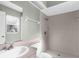 Small bathroom with a walk-in shower, sink, and pale pink counter top at 4221 San Rafael Ave, New Port Richey, FL 34655