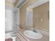 Bathroom featuring a sink, a large mirror, and a shower/tub combo at 4221 San Rafael Ave, New Port Richey, FL 34655