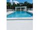Enjoy the community pool with ample seating, shade and sparkling clear water at 4221 San Rafael Ave, New Port Richey, FL 34655