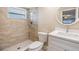 Updated bathroom featuring a tiled shower, new vanity, modern fixtures and decor at 4468 Rudder Way, New Port Richey, FL 34652