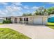 Inviting single-story home featuring a neatly maintained front yard and attached garage at 4468 Rudder Way, New Port Richey, FL 34652