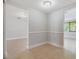 Neutral hallway with access to multiple rooms, showcasing clean lines and neutral tones at 4468 Rudder Way, New Port Richey, FL 34652