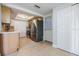 Well-lit kitchen featuring stainless steel appliances and tile flooring at 4468 Rudder Way, New Port Richey, FL 34652