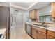 Traditional kitchen featuring stainless steel appliances and bright countertops at 4468 Rudder Way, New Port Richey, FL 34652