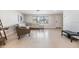 Spacious living room with tile floors and a comfortable seating area at 4468 Rudder Way, New Port Richey, FL 34652