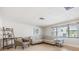 Bright living room with tile flooring and a stylish seating arrangement at 4468 Rudder Way, New Port Richey, FL 34652