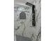 Close up of a modern shower featuring a rainfall showerhead, handheld sprayer, and marble wall tiles at 4595 Lake In The Woods Dr, Spring Hill, FL 34607