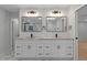 Bathroom featuring marble vanity with and basins at 4595 Lake In The Woods Dr, Spring Hill, FL 34607
