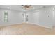 Spacious bedroom with wood floors and plenty of natural light at 4595 Lake In The Woods Dr, Spring Hill, FL 34607