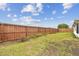 Fenced backyard with plenty of green space at 5642 Dove Dr, New Port Richey, FL 34652