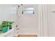 Bathroom tub and shower combo with a white shower curtain at 5642 Dove Dr, New Port Richey, FL 34652