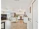 Bright kitchen features stainless steel appliances, white cabinetry, and a charming kitchen island at 5642 Dove Dr, New Port Richey, FL 34652