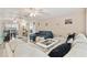 Expansive living room with stylish decor, including comfortable seating and light wood flooring at 5642 Dove Dr, New Port Richey, FL 34652