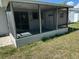 Enclosed patio area for outdoor relaxing at 6406 Stone Rd, Port Richey, FL 34668