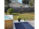 Relaxing backyard with hot tub and well-maintained landscaping at 6603 Adams St, New Port Richey, FL 34652