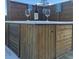 Inviting hot tub area with custom wood paneling, perfect for relaxing with a glass of wine at 6603 Adams St, New Port Richey, FL 34652
