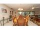 Dining room featuring a wooden table and chairs at 6620 Brambleleaf Dr, Spring Hill, FL 34606