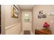Inviting entryway with a white front door and charming decor at 6620 Brambleleaf Dr, Spring Hill, FL 34606