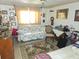 Bedroom featuring a patterned area rug, a futon, and small writing desk at 7323 Ray Browning Rd, Brooksville, FL 34601