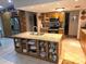 Well-equipped kitchen with a central island, stainless steel appliances, and plenty of storage at 7323 Ray Browning Rd, Brooksville, FL 34601