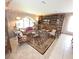 Cozy living room with traditional furniture, area rug, and built-in display cabinet at 7323 Ray Browning Rd, Brooksville, FL 34601