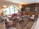 Comfortable living room with ample seating, natural light, and decorative furnishings at 7323 Ray Browning Rd, Brooksville, FL 34601