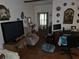 Cozy living room provides a comfortable space, with a TV, decor, and furniture filling the interior at 7323 Ray Browning Rd, Brooksville, FL 34601