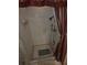 Shower stall featuring white tile surround, handheld shower head, and decorative curtain at 7323 Ray Browning Rd, Brooksville, FL 34601