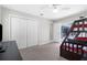 Bedroom featuring a bunk bed and closet, with sliding door access to the pool area at 8084 Nightingale Rd, Weeki Wachee, FL 34613